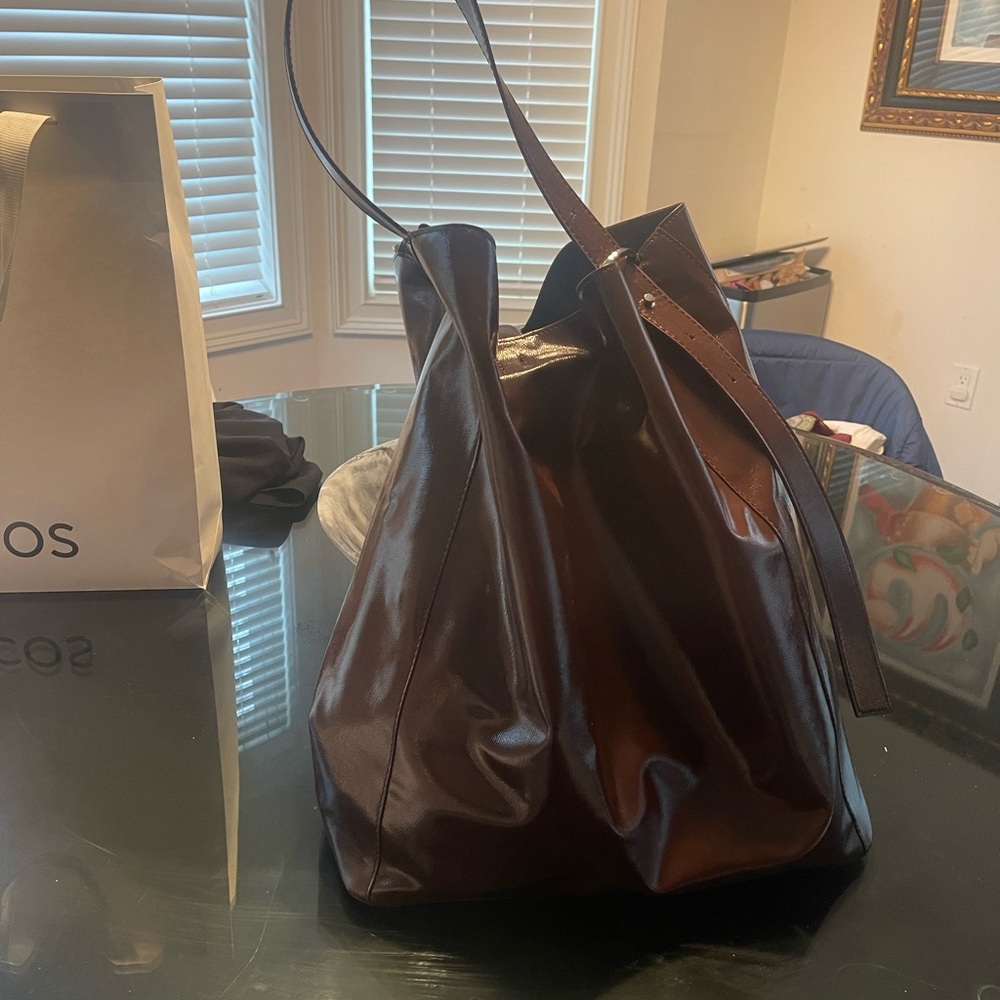 Brown Leather Tote with Glossy Finish and Drawstring Closure